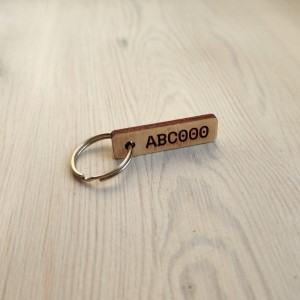 Key tag with metal ring and code
